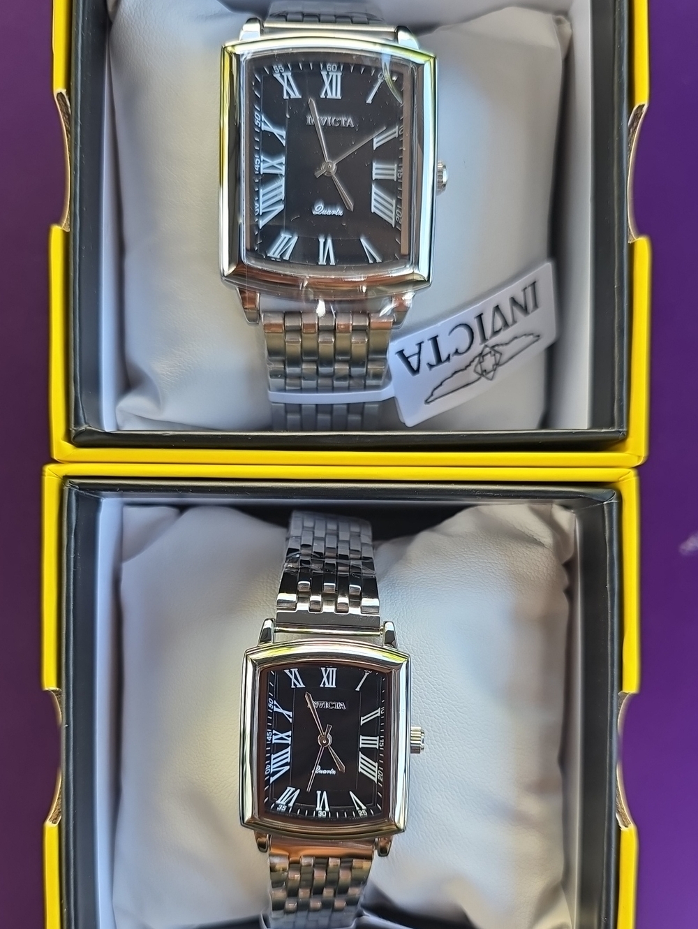 676. His And Hers Black / Stanless Steel Invicta Watches